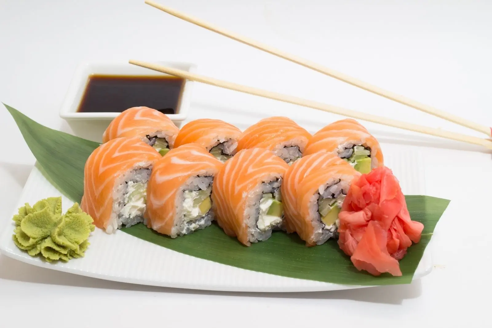 Sushi roll wrapped in salmon with cream cheese and avocado at Tokyo Sushi, a Japanese Restaurant in Ocala